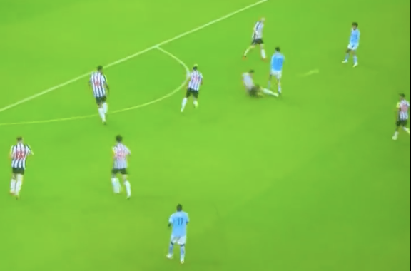 tackle by Paul Dummett